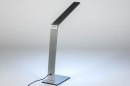 Foto 13530-4: Strakke tafellamp in staal voorzien van vier instelbare lichttinten.