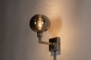 Foto 31103-2 schuinaanzicht: Wandlamp met bol van rookglas en schakelaar op wandplaat met snoer en stekker