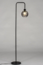 Foto 74035-13: Moderne, stimmungsvolle Stehleuchte mit einer Rauchglaskugel und einer besonders schön verarbeiteten Lampenfassung.