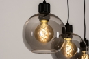 Foto 74037-11: Zwarte hanglamp met drie bollen van rookglas en luxe fittingen
