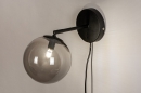 Foto 74129-6 anders: Zwarte wandlamp met bol van rookglas en schakelaar op de wandplaat