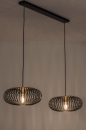 Foto 74246-3 schuinaanzicht: Zwarte hanglamp met Open Metalen Lampenkap met spijlen en Messing details voor sfeervolle verlichting boven de eettafe