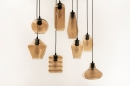 Foto 74544-62 schuinaanzicht: Zwarte hanglamp met amberkleurige glazen bollen in verschillende vormen en hoogtes 