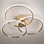 Foto 75022-2 onderaanzicht: Moderne led plafondlamp die bestaat uit drie cirkels in goud, dimbaar zonder dimmer